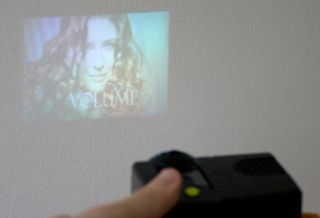 Illustration for article titled EyeClops $100 Mini Projector Review (Just More Childhood Trauma)